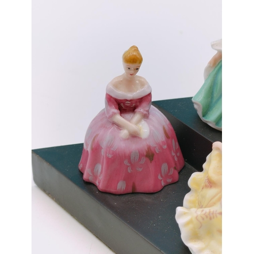 562 - 9 x Royal Doulton Minature Ladies on Stand.