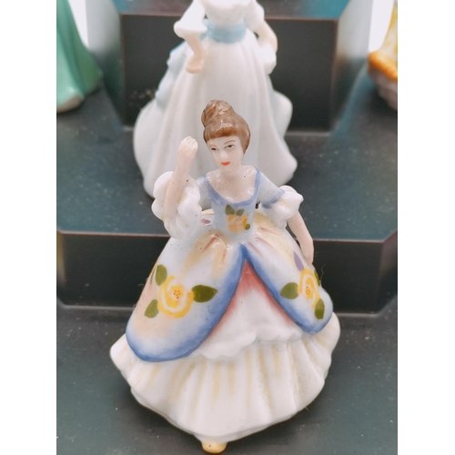 562 - 9 x Royal Doulton Minature Ladies on Stand.