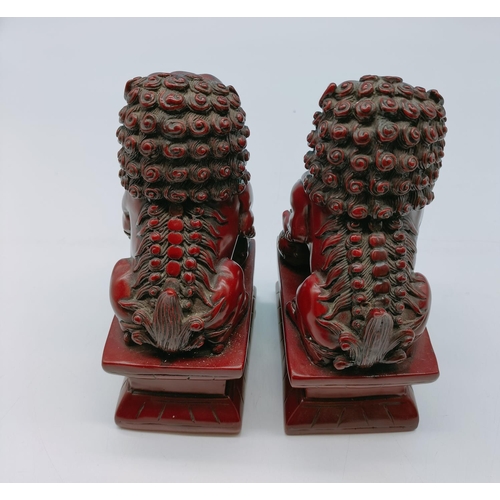 126 - Chinese Red Resin Foo Dogs (2). 17cm Tall.