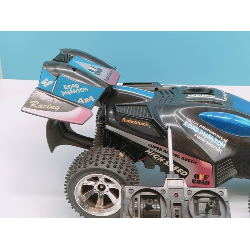 142 - Vintage 4x4 Road Phantom Car/Buggy with Remote Control. 51cm x 32cm.