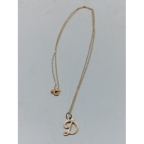 213 - 9ct Gold 'D' Pendant and 16