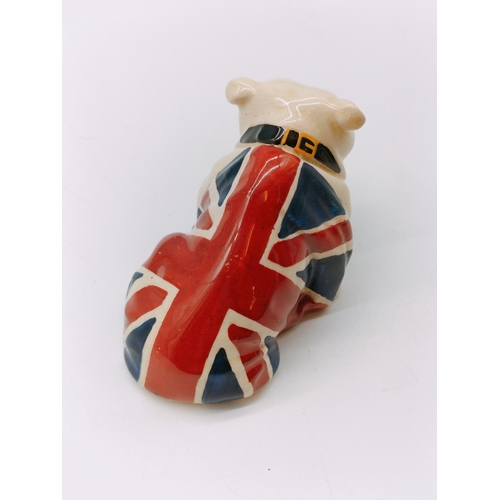 238 - Royal Doulton Figure of a Small Bulldog with Union Jack Design. Rd No 645658.  4cm High x 9cm.