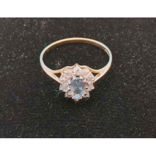 405 - 9ct Gold Ring with Aquamarine and Cubic Zirconia. 1.6 Grams. Size O+