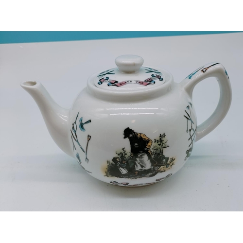 497 - Paul Cardew Teapot 'God Bless the Gardener'.