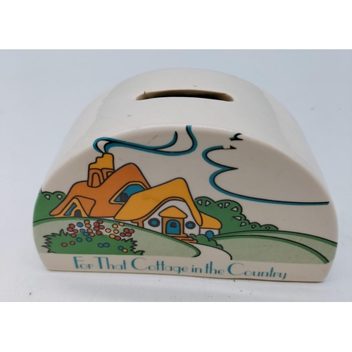 526 - 'For That Cottage in the Country' Moneybox with Stopper. 13cm x 8cm.