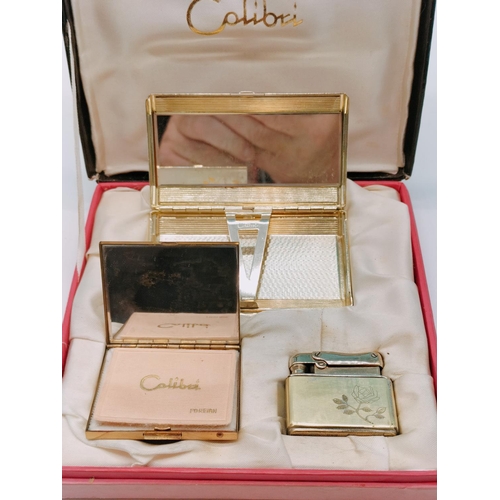 72 - Boxed Colibri Ladies Compact Cigarette Case and Lighter.