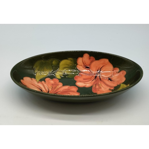 323 - Moorcroft Oval Bowl in the 'Hibiscus' Pattern. 5cm High, 23cm x 13cm.