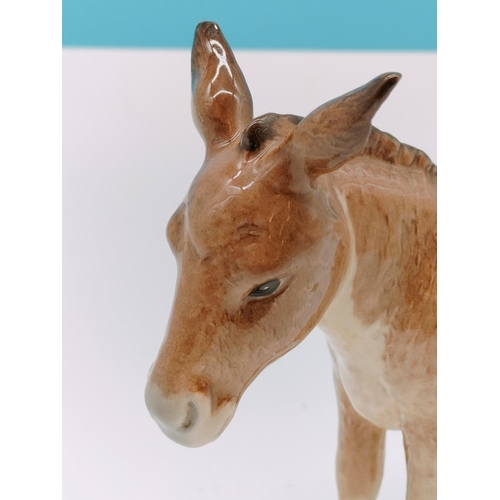 306 - Beswick Figure of a Donkey. 14cm High x 18cm.