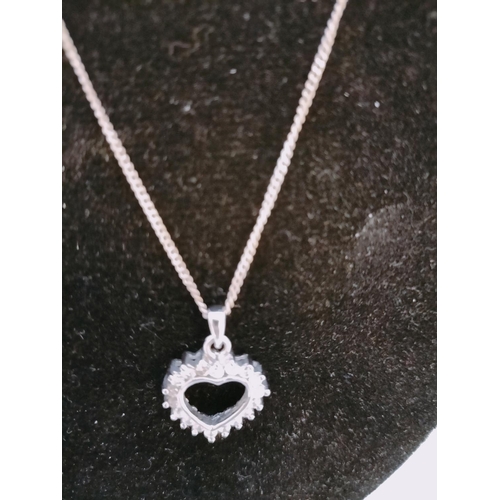 359 - 925 Silver and Cubic Zirconia Heart Pendant plus White Metal Chain.