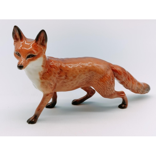 378 - Beswick Figure of a Standing Fox. 14cm High x 21cm.