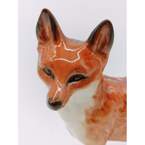 378 - Beswick Figure of a Standing Fox. 14cm High x 21cm.