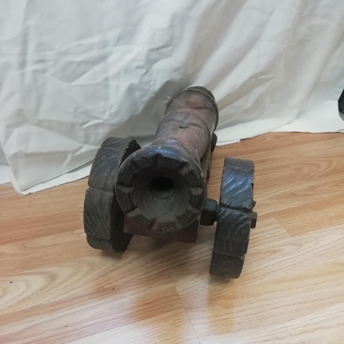 597 - Wooden Model of a Cannon. 25cm High x 45cm.