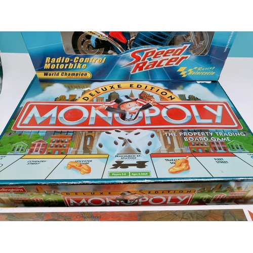 813 - Deluxe Edition Monopoly, Risk Board Games plus Remote Control Speed Racer. New & Boxed.