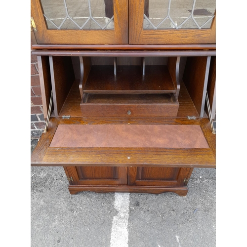 49 - Priory Design Oak Bureau Cabinet with Display Top. 191cm High, 82cm x 43cm. Collection only.