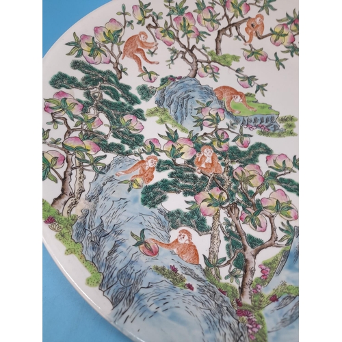 375 - Mid 20th Century Hand Painted 43cm Chinese Charger decorated with Monkeys in Fruit Trees.