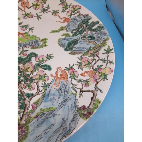 375 - Mid 20th Century Hand Painted 43cm Chinese Charger decorated with Monkeys in Fruit Trees.