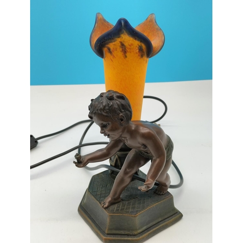 207 - Bronze Effect 29cm Boy Table Lamp with Orchid Shape Shade W/O.