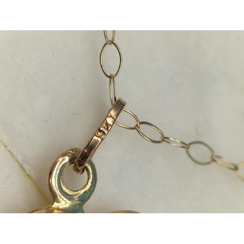 100 - 9ct Gold Dolphin Stone Set Pendant and Chain. 1.1 Grams.