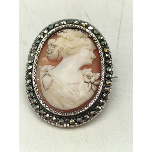73 - Silver Cameo Brooch with Marcasite Border. 3cm Diameter.