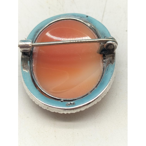 73 - Silver Cameo Brooch with Marcasite Border. 3cm Diameter.