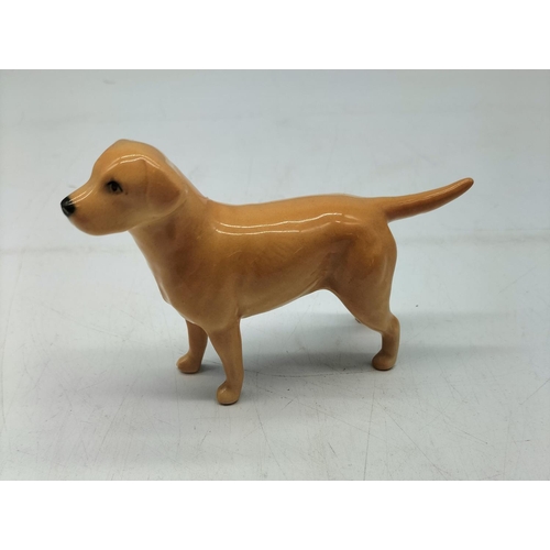84 - Beswick Figure of a Labrador Dog. 8cm High.