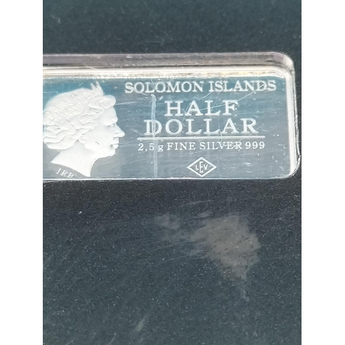 94 - Cased 999 Fine Silver Solomon Islands Half Dollar 2.5 Gram Ingot.