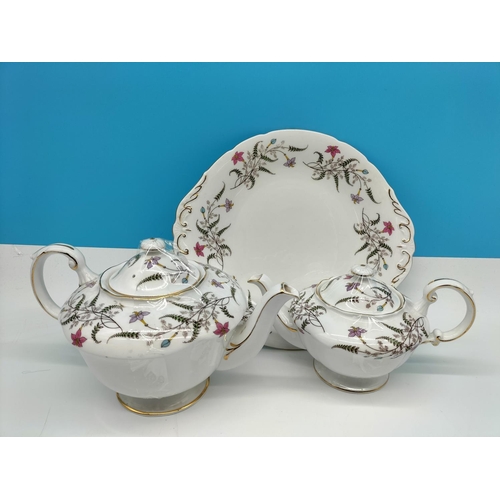 677 - Paragon 22 Piece Part Tea Set to include Cups, Saucers, Side Plates, Teapots (2), Cake Plate, etc.