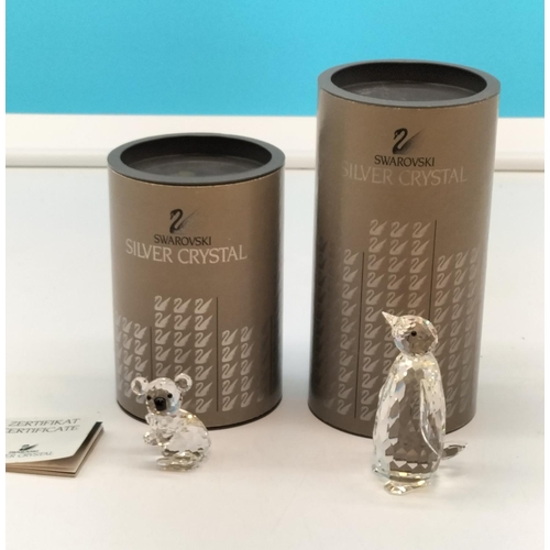 32 - Boxed Swarovski Crystal 8cm Penguin and Koala Figures.