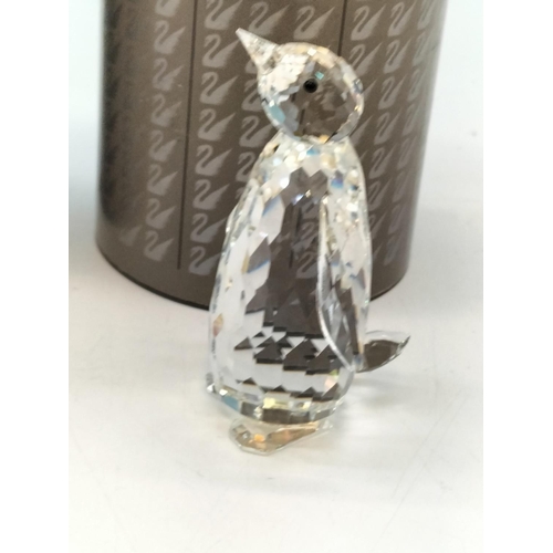 32 - Boxed Swarovski Crystal 8cm Penguin and Koala Figures.