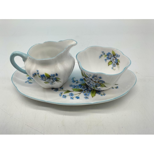 63 - Shelley China Under Tray, Sugar and Cream in a 'Forget-Me-Nots' Pattern. Small Nip to Rim of Sugar.