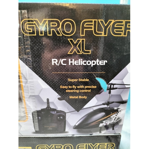 64 - 2 x Boxed Red 5 Gyro Flyer XL Remote Control Helicopter. Untested.