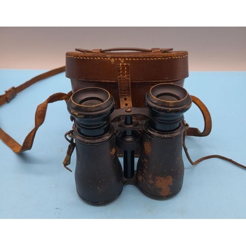 724 - Royal Marine Binoculars in Brown Leather Case.