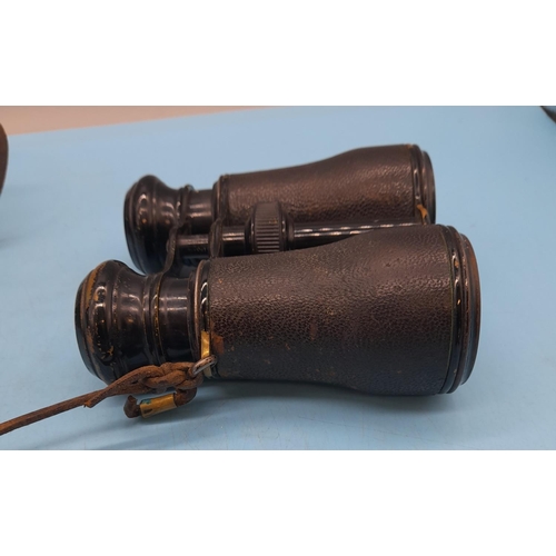 724 - Royal Marine Binoculars in Brown Leather Case.