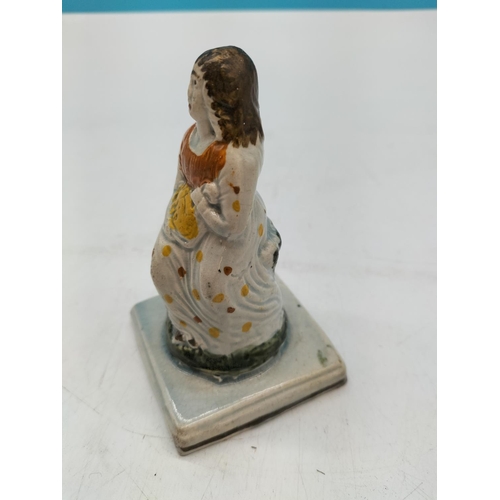 77 - Pratt Ware c1840 Lady Figure. 11.5cm Tall. Damage to Corner of base.