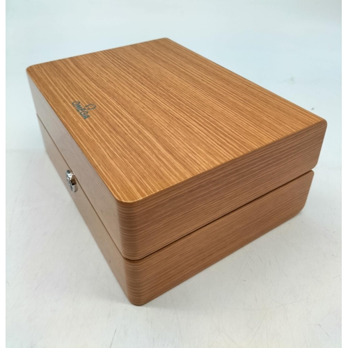 81 - Omega Wooden Watch Case. Requires Re-Lining. 10cm High, 22cm x 17cm.