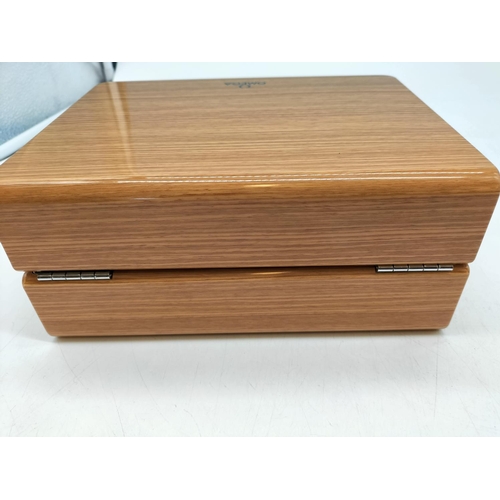 81 - Omega Wooden Watch Case. Requires Re-Lining. 10cm High, 22cm x 17cm.