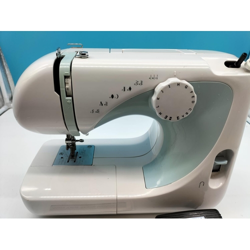 411 - Argos Value Range Sewing Machine With Manual. W/O