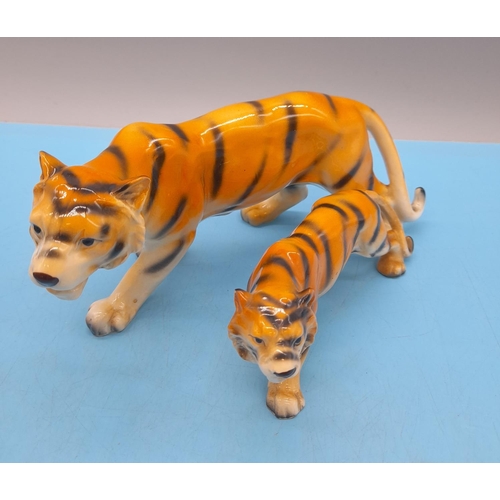 417 - KK Japanese Porcelain Prowling Tiger & Cub Plus Lion Figures. Tallest 11cm (h) x 22cm (l)