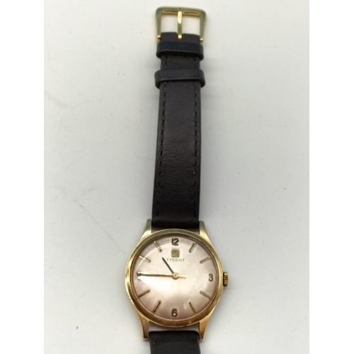 57 - 9ct Tissot Mechanical Wristwatch With Leather Strap. W/O