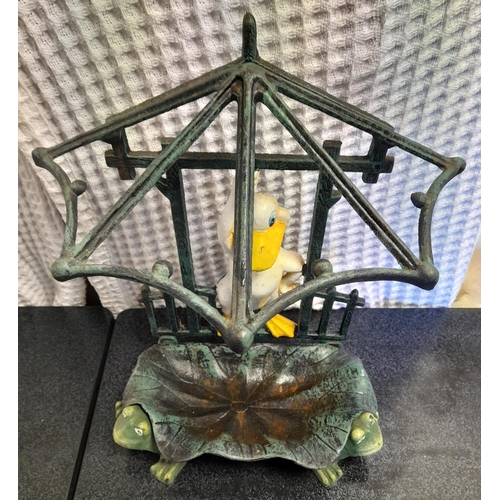 210A - Cast metal umbrella stand featuring a duck with frogs hiding under the lily pad 45x25x15cm