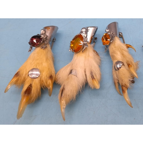 48 - Collection of Scottish grouse foot brooches.