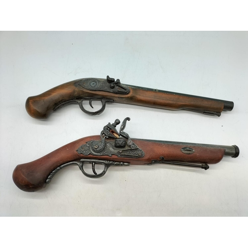 688 - 2 replica display pistols one is A/F 40cm Length