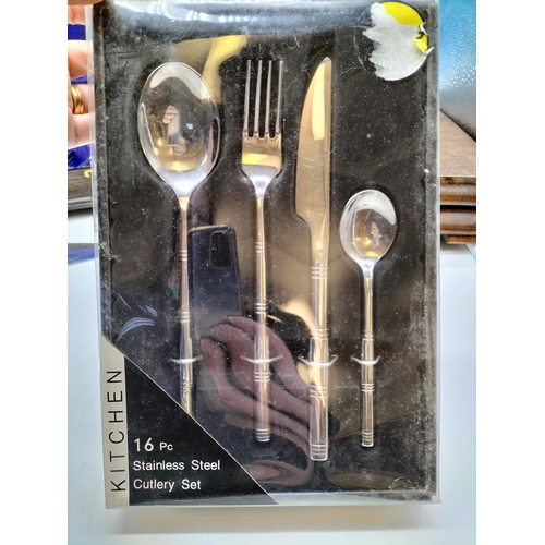 689 - two vintage canteens of cutlery, A Modern stainless streel cutlery set, a cake slice with silver hal... 