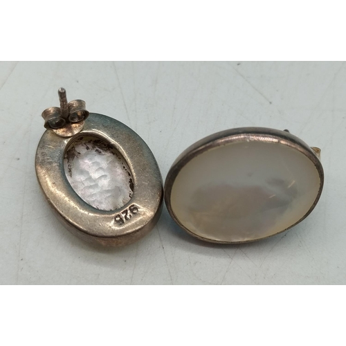 85 - silver and mother of pearl set earrings