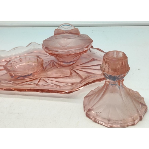 105 - Ladies dressing table set, salmon coloured glass, 5 pieces