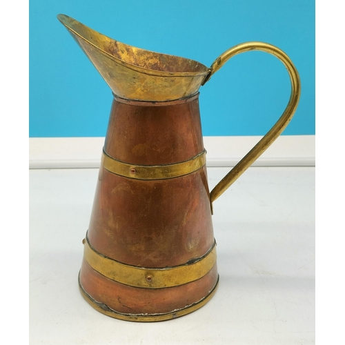 110 - Arts and crafts style copper and brass Jug Height 25cm