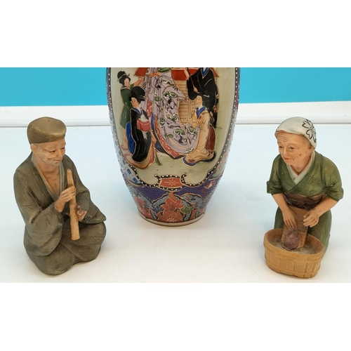 229 - Oriental vase H31cm and two Figures 14cm in height