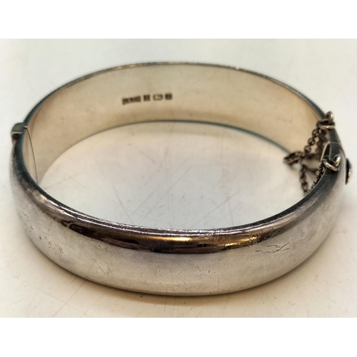 269 - Birmingham Hallmarked Sterling Silver Hinge Bangle. 25g