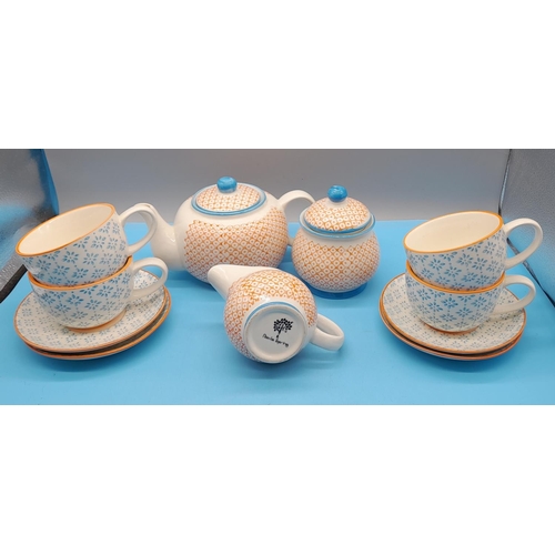 285 - Nicola Spring contrast Blue and Orange 11piece part tea set 
Teapot H13cm