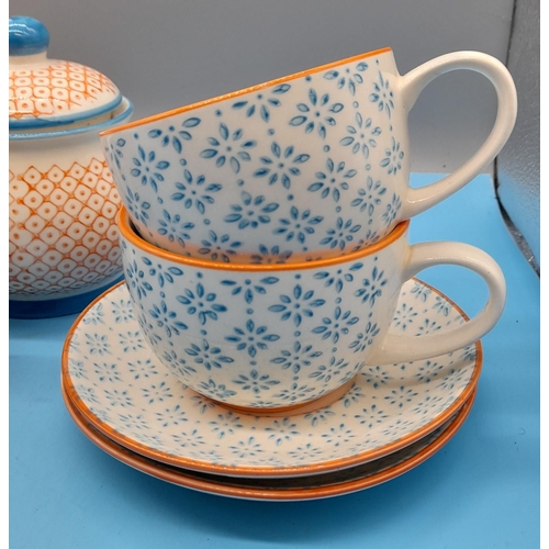 285 - Nicola Spring contrast Blue and Orange 11piece part tea set 
Teapot H13cm